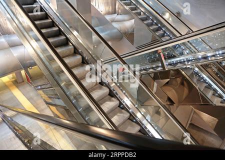Many Long Escalators in Underground Metro Station Italy Stock Photo