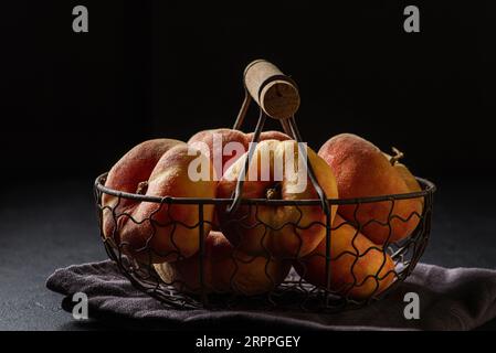 fig peaches on a black background. High quality photo Stock Photo
