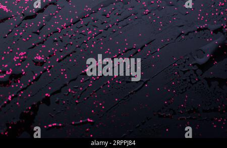 Water drops on red background Stock Photo