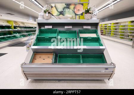 200321 -- LONDON, March 21, 2020 Xinhua -- Photo taken on March 21, 2020 shows empty shelves of a supermarket in London, Britain. As of 9a.m. 0900GMT on Saturday, 72,818 people have been tested in Britain, of which 67,800 were confirmed negative and 5,018 were confirmed positive. 233 patients in the country who tested positive for the virus have died. Xinhua BRITAIN-LONDON-COVID-19 PUBLICATIONxNOTxINxCHN Stock Photo