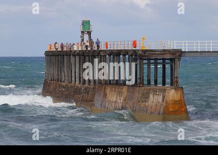 A view of the end of West Pier in Whitby,North Yorkshire,UK Stock Photo