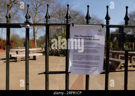 200324 -- LONDON, March 24, 2020 -- A closed children s playground is seen in Hyde Park after the British government placed further restrictions on movement in London, Britain on March 24, 2020. British Prime Minister Boris Johnson announced Monday evening a series of measures that aim to restrict social contact in the UK, so as to curb the spread of COVID-19. Starting from Monday night, people in Britain will only be allowed to leave their homes for very limited purposes , including shopping for basic necessities, for any medical need, for one form of exercise a day, and to travel to and from Stock Photo