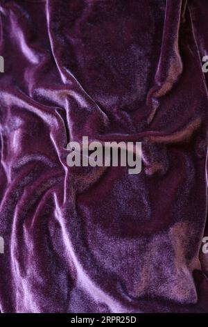 burgundy colored velvet fabric texture Stock Photo