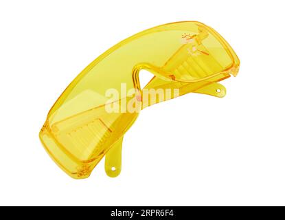 Yellow plastic protective work glasses isolated on a white background Stock Photo