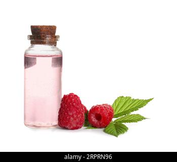 Bottle of cosmetic raspberry oil on white background Stock Photo - Alamy