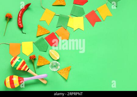 Frame made of Mexican symbols for Independence Day on green background Stock Photo