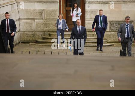 200409 -- LONDON, April 9, 2020 Xinhua -- British Foreign Secretary Dominic RaabC arrives at 10 Downing Street for a meeting in London, Britain on April 8, 2020. During Wednesday s Downing Street daily press briefing, Chancellor of the Exchequer Rishi Sunak said Prime Minister Boris Johnson s condition is improving and remains in intensive care. Johnson was admitted to St Thomas Hospital in London with persistent symptoms on Sunday night, 10 days after testing positive for COVID-19. He was moved into intensive care on Monday night after his coronavirus symptoms worsened. Photo by Tim Ireland/X Stock Photo