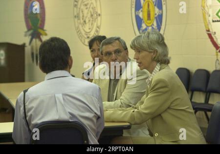 Department of Interior delegation, including Secretary Gale Norton, right foreground, conferring with United Tribes Technical College officials duringtour of the campus in Bismarck, North Dakota. Secretary's Bismarck visit culminated with participation in meeting of Tribal Leaders-Department of Interior Task Force on Trust Reform Stock Photo