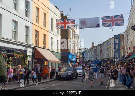 Crowds of shoppers in Portobello Road, London UK, in the Royal Borough of Kensington and Chelsea Stock Photo