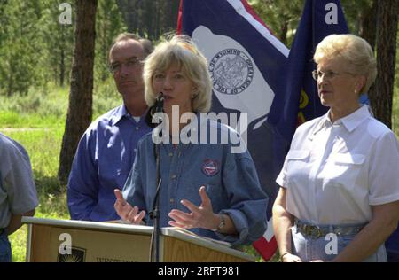 Secretary Gale Norton speaking, with Idaho Governor Dirk Kempthorne and Montana Governor Judy Martz behind, left to right, during the Western Governors' Association Forest Health Summit in Missoula, Montana Stock Photo