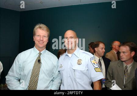 Former New York Giants Phil Simms waves to fans as he is inducted into the Giants  Ring of Honor at New Meadowlands Stadium in East Rutherford, New Jersey,  Sunday, October 3, 2010. (