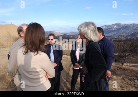 Secretary Gale Norton, right foreground, and Acting Assistant Secretary for Indian Affairs Aurene Martin, left foreground, visiting the Barona Reservation, home of the Barona Band of Mission Indians, near Lakeside, California, for survey of the extensive damage caused by the Cedar fire and discussions withfederal and tribal officials Stock Photo