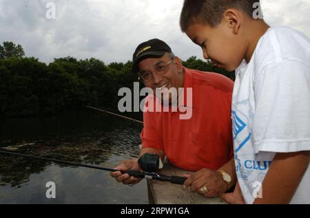 Assisting Youth Fishing.jpg