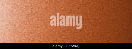 Abstract background, wide banner with orange gradient leather texture. Genuine structure, luxury pattern.  Gradient, wallpaper, panoramic,  wide, web Stock Photo