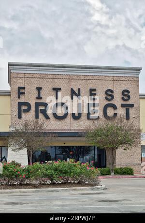 Humble, Texas USA 02-26-2023: Fitness Project building exterior in Humble, TX. Health and fitness business chain located in Texas. Stock Photo