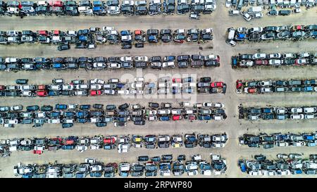 Aerial view image of scrap cars. Aerial view of old cars. Cars for spare parts. Stock Photo