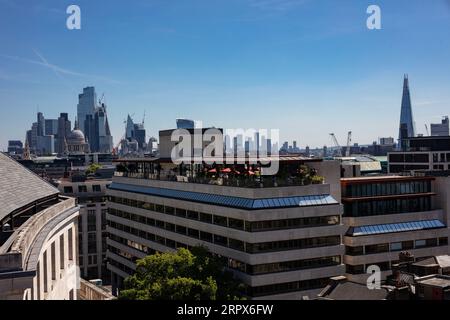 A view from the roof of the main building of King's College, London over skyline of London with landmark buildings. Stock Photo