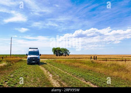 Airstream Interstate 24X 4WD campervan; rural ranch road; Badlands; South Dakota; USA Stock Photo