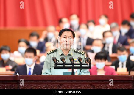 200524 -- BEIJING, May 24, 2020 -- Qi Jianguo, a member of the 13th National Committee of the Chinese People s Political Consultative Conference CPPCC, delivers a speech at the second plenary meeting of the third session of the 13th CPPCC National Committee at the Great Hall of the People in Beijing, capital of China, May 24, 2020.  TWO SESSIONSCHINA-BEIJING-CPPCC-ANNUAL SESSION-SECOND PLENARY MEETING CN LiuxBin PUBLICATIONxNOTxINxCHN Stock Photo