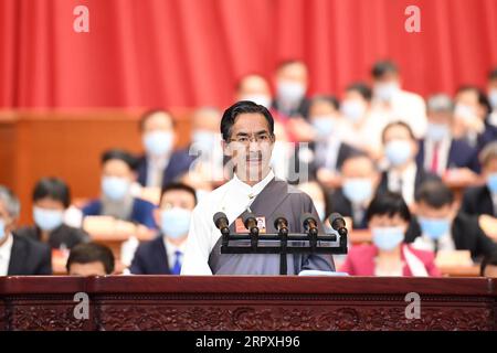 200524 -- BEIJING, May 24, 2020 -- Nyima Zhaxi, a member of the 13th National Committee of the Chinese People s Political Consultative Conference CPPCC, delivers a speech at the second plenary meeting of the third session of the 13th CPPCC National Committee at the Great Hall of the People in Beijing, capital of China, May 24, 2020.  TWO SESSIONSCHINA-BEIJING-CPPCC-ANNUAL SESSION-SECOND PLENARY MEETING CN YanxYan PUBLICATIONxNOTxINxCHN Stock Photo