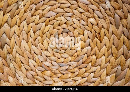 background and texture of braided straw with circular pattern Stock Photo