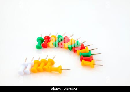 color drawing pin on white background Stock Photo - Alamy