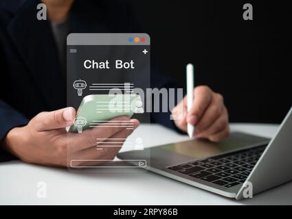 Business people use computers and work phones. There is a smart AI system to help make work faster. chat bot. Smart AI system concept. Concept technol Stock Photo