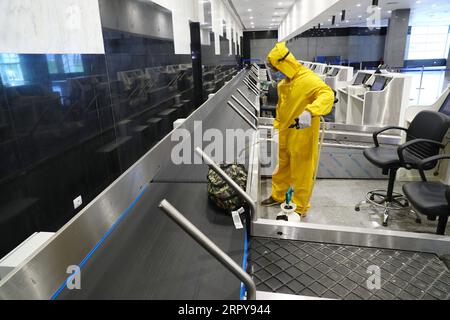 Ägypten, Vorbereitungen für Wiederaufnahme des Reiseverkehrs in Scharm El Scheich 200620 -- SHARM EL-SHEIKH EGYPT, June 20, 2020 Xinhua -- A worker sprays disinfectant to luggages at Sharm El-Sheikh International Airport in Sharm El-Sheikh, Egypt, on June 20, 2020. Egypt confirmed on Saturday 1,547 new COVID-19 cases, raising the total infections registered in the country to 53,758, according to Egyptian Health Ministry. Xinhua/Ahmed Gomaa EGYPT-SHARM EL-SHEIKH-COVID-19-CASES PUBLICATIONxNOTxINxCHN Stock Photo