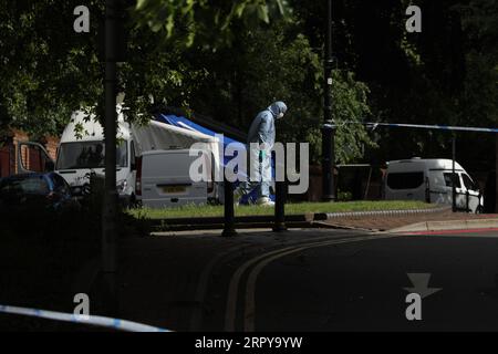 200621 -- READING BRITAIN, June 21, 2020 Xinhua -- A Police forensic officer works behind a police cordon near Forbury Gardens where stabbings took place in Reading, Britain, on June 21, 2020. Britain s counter-terrorism police said Sunday that the stabbing incident taking place in southern England s town of Reading on Saturday night has now been declared a terrorist incident. Photo by Tim Ireland/Xinhua BRITAIN-READING-STABBING-TERRORIST INCIDENT PUBLICATIONxNOTxINxCHN Stock Photo