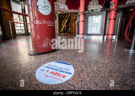 200622 -- PARIS, June 22, 2020 Xinhua -- Social distancing markers are installed on the ground before Le Grand Rex cinema reopens in Paris, France on June 22, 2020. France, which gradually eased national lockdown from May 11, entered a new phase of de-confinement on Monday. Cinemas and casinos resumed activities and sports event attracting no more than 5,000 people would be allowed. Photo by Aurelien Morissard/Xinhua FRANCE-PARIS-CINEMA-REOPEN PUBLICATIONxNOTxINxCHN Stock Photo