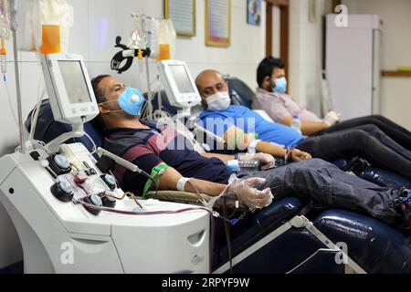 200629 -- BAGHDAD, June 29, 2020 Xinhua -- Patients recovered from COVID-19 donate plasma at the National Blood Transfusion Center in Baghdad, Iraq, June 28, 2020. The Iraqi Health Ministry on Monday said that 1,749 new COVID-19 cases are detected, bringing the total infections to 47,151, while up to 1,852 recoveries were registered during the day. Xinhua/Khalil Dawood IRAQ-BAGHDAD-COVID-19-PLASMA-DONATION PUBLICATIONxNOTxINxCHN Stock Photo