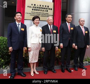 200708 -- HONG KONG, July 8, 2020 -- Tung Chee-hwa and Leung Chun-ying, both vice chairmen of the National Committee of the Chinese People s Political Consultative Conference, Carrie Lam, chief executive of the Hong Kong Special Administrative Region HKSAR, Luo Huining, deputy director of the Hong Kong and Macao Affairs Office of the State Council, and Zheng Yanxiong, director of the newly established national security office, attend an opening ceremony of the Office for Safeguarding National Security of the Central People s Government in the HKSAR in Hong Kong, south China, July 8, 2020. The Stock Photo