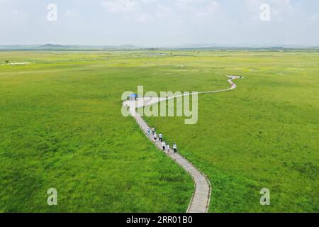 200722 -- ZHENGLAN BANNER, July 22, 2020 -- Aerial photo taken on July 22, 2020 shows people visiting the Jinlianchuan Pasture in Zhenglan Banner of Xilingol League, north China s Inner Mongolia Autonomous Region.  CHINA-INNER MONGOLIA-XILINGOL LEAGUE-PASTURE CN LiuxLei PUBLICATIONxNOTxINxCHN Stock Photo