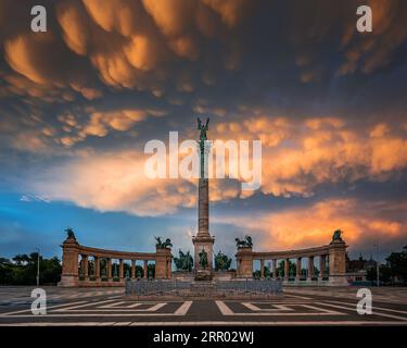 Budapest, Hungary - Unique mammatus clouds over Heroes' Square Millennium Monument at Budapest after a heavy thunderstorm on a summer afternoon sunset Stock Photo