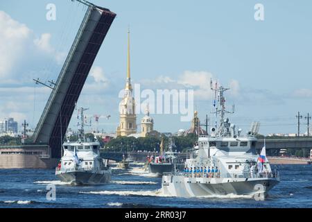 200726 -- MOSCOW, July 26, 2020 Xinhua -- Russian navy ships sail during a military parade to celebrate Russian Navy Day in St. Petersburg, Russia, July 26, 2020. The naval parade in St. Petersburg involved 46 ships and submarines, more than 40 planes and helicopters, and over 4,000 servicemen. Smaller celebrations were held in the country s other fleet bases. Russia marks its Navy Day annually on the last Sunday of July. Photo by Irina Motina/Xinhua RUSSIA-ST. PETERSBURG-NAVY DAY-CELEBRATION-PARADE PUBLICATIONxNOTxINxCHN Stock Photo