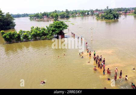 200726 -- BIHAR INDIA, July 26, 2020 -- Photo taken on July 26, 2020 shows an aerial view of the flood-affected village in Darbhanga district, India s eastern state of Bihar. At least 10 people were killed and nearly 1.5 million people were affected by floods in 11 districts in India s eastern state of Bihar, the state disaster management department said in a bulletin on Sunday. Str/Xinhua INDIA-BIHAR-FLOODS ParthaxSarkar PUBLICATIONxNOTxINxCHN Stock Photo