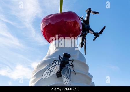 200730 -- LONDON, July 30, 2020 Xinhua -- Photo taken on July 30, 2020 shows the Fourth Plinth sculpture titled The End at Trafalgar Square in London, Britain. A new artwork by artist Heather Phillipson was unveiled Thursday on the Fourth Plinth in London s Trafalgar Square. Entitled THE END, the sculpture tops the Fourth Plinth with a giant swirl of whipped cream, a cherry, a fly and a drone that transmits a live feed of Trafalgar Square. Photo by Ray Tang/Xinhua BRITAIN-LONDON-FOURTH PLINTH SCULPTURE-UNVEILING PUBLICATIONxNOTxINxCHN Stock Photo