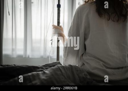 Patient getting Intravenous therapy treatment Stock Photo
