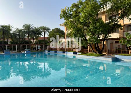 The swimming pool at Radisson Hotel located in Alibaug a beachside town in the Raigad District in Alibaug, India Stock Photo