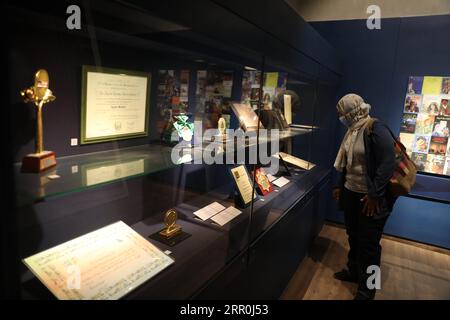 200816 -- CAIRO, Aug. 16, 2020 -- A visitor views exhibits at the Naguib Mahfouz Museum in Cairo, Egypt, on Aug. 13, 2020. In an ancient redeveloped two-floor building dating back to 1774, Naguib Mahfouz Museum and Creativity Center is located in the heart of Cairo, just near monumental Al-Azhar Mosque, to commemorate the life and works of Egypt s Nobel laureate novelist who died in August 2006.  TO GO WITH Feature: Naguib Mahfouz museum sheds light on biography, works of Egypt s Nobel laureate novelist EGYPT-CAIRO-NAGUIB MAHFOUZ MUSEUM AhmedxGomaa PUBLICATIONxNOTxINxCHN Stock Photo