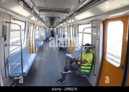 200816 -- CAIRO, Aug. 16, 2020 -- People wearing face masks are seen in a metro train in Cairo, Egypt, on Aug. 16, 2020. Egypt confirmed on Sunday 139 new COVID-19 infections and 19 deaths, raising the total cases registered in the country since the outbreak of the pandemic to 96,475 and the death toll to 5,160, said the Egyptian Health Ministry.  EGYPT-CAIRO-COVID-19-CASES AhmedxGomaa PUBLICATIONxNOTxINxCHN Stock Photo