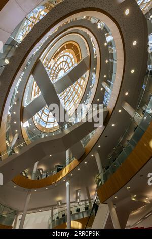 The spectacular atrium and staircase in Liverpool Central Library, England, UK Stock Photo