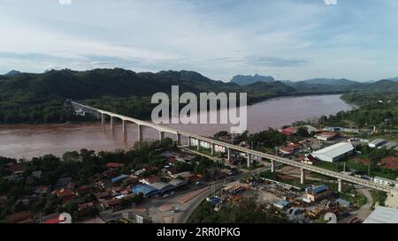 200823 -- VIENTIANE, Aug. 23, 2020 -- Aerial photo taken on July 17, 2020 shows the China-Laos Railway s Luang Prabang Mekong River Super Major Bridge in Laos. The China-Laos Railway will run more than 400 km from Boten border gate in northern Laos, bordering China, to Vientiane with an operating speed of 160 km per hour. The project started in Dec. 2016 and is scheduled to be completed and open to traffic in December 2021. Photo by /Xinhua LAOS-VIENTIANE-CHINA-LAOS RAILWAY MeixZhengyou PUBLICATIONxNOTxINxCHN Stock Photo