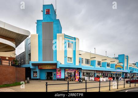 Art deco buildings on Marine Promenade, New Brighton, Wirral, including New Palace Arcade and Adventureland. Stock Photo