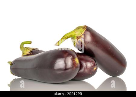 Three ripe eggplants, macro, isolated on white background. Stock Photo