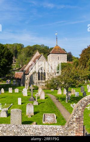 Church and graveyard in East Dean Eastdean at Eastbourne, East Sussex, UK in September Stock Photo