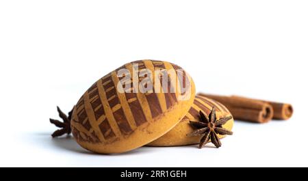 Several gingerbread cookies with cinnamon and star anise, on a white background Stock Photo