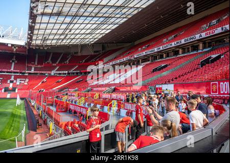 Stadium tour inside Manchester United’s Old Trafford stadium in Manchester, UK Stock Photo