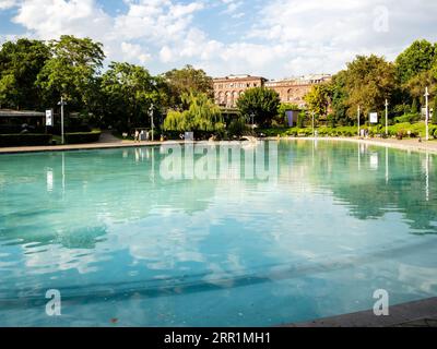 Yerevan, Armenia - August 21, 2023: water surface of Swan Lake decorative reservoir in the center of Yerevan city near Freedom Square on sunny summer Stock Photo