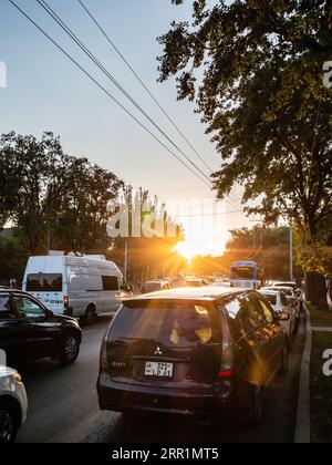 Yerevan, Armenia - August 24, 2023: road traffic on Marshal Baghramyan Ave in Yerevan city at sunset on summer evening Stock Photo